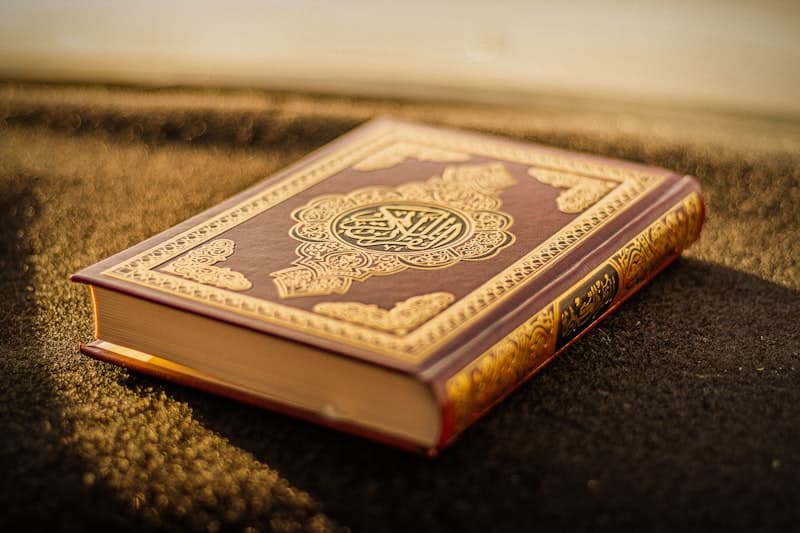 Quran pages with soft lighting